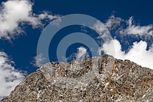 Rocky mountain peak under blue sky