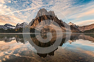 Rocky mountain reflection on Cerulean lake in Assiniboine provincial park