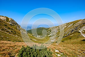 Rocky mountain tops with hiking trails in autumn in Slovakian Ta