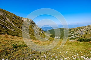 Rocky mountain tops with hiking trails in autumn in Slovakian Ta