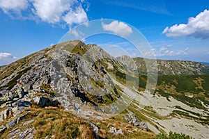 Rocky mountain tops with hiking trails in autumn in Slovakian Ta