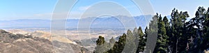 Rocky Mountain Wasatch Front peaks, panorama landscape view from Butterfield canyon Oquirrh range by Rio Tinto Bingham Copper Mine