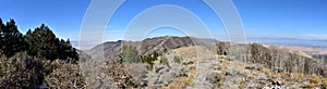 Rocky Mountain Wasatch Front peaks, panorama landscape view from Butterfield canyon Oquirrh range by Rio Tinto Bingham Copper Mine