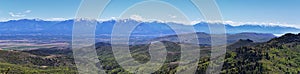 Rocky Mountain Wasatch Front peaks, panorama landscape view from Butterfield Canyon Oquirrh range by Rio Tinto Bingham Copper Mine