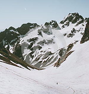 Rocky Mountains and climber man on glacier Landscape