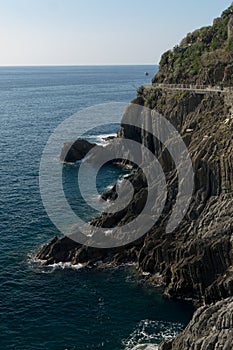 The rocky mountains and dangerous road at the edge of the cliff