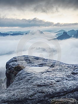 Rocky mountains with stones on ground in Alps