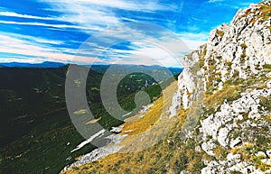 Rocky mountains with stones on ground in Alps