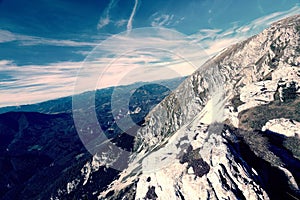 Rocky mountains with stones on ground in Alps