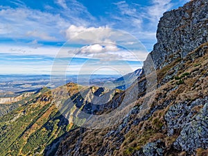 The rocky mountainsides are covered in moss