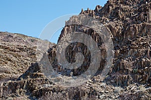 Rocky outcrop in arid Namib Desert of Angola