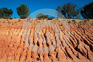 Rocky outcroppings in Algarve, Portugal, represent soil erosion by water.