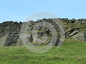 Rocky outcrops and stone walls in yorkshire moors