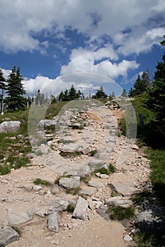 Rocky path in mountains photo