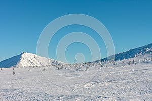 The rocky peak of mountain Snezka, krkonose mountains. Snezka is mountain on border between Czech Republic and Poland