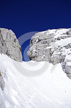 Rocky peak with snow.