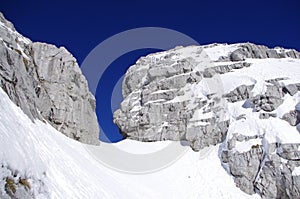 Rocky peak with snow.