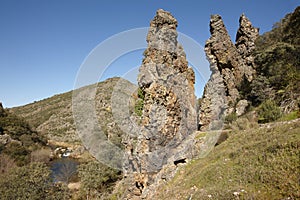 Rocky pinnacles and stream in Boqueron route. Cabaneros, Spain