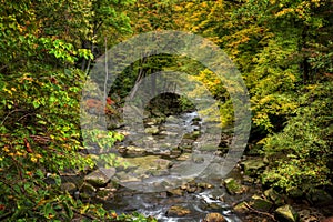 Rocky River In Autumn