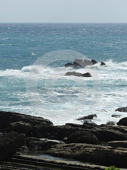 The rocky road leading to the sea, the former way blue sea and sky. photo