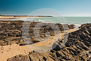 Rocky and sandy beach in Normandy