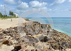 The rocky and sandy beach outside of  Gilbert`s Bar House of Refuge in Stuart, FL