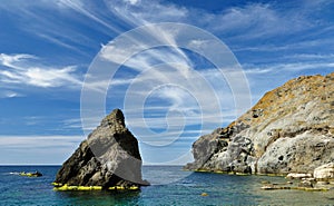 Rocky sea coast at midday