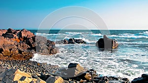 rocky sea shore in the afternoon.