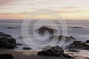 Rocky seascape at dusk