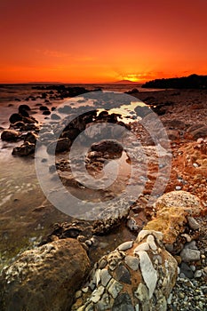 Rocky seascape sunset