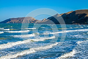 Rocky seashore with blue sky