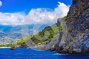 Rocky seashore with ships