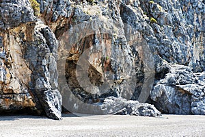 The rocky section of the Troncone beach, Marina di Camerota, Italy. Naturism.