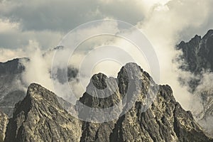 Rocky sharp mountain tops in Tatra mountains in Slovakia - vintage retro look