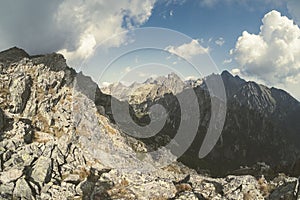 Rocky sharp mountain tops in Tatra mountains in Slovakia - vintage retro look