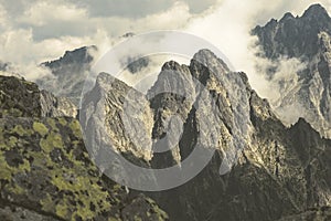 Rocky sharp mountain tops in Tatra mountains in Slovakia - vintage retro look