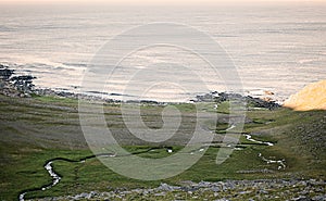 A rocky shore of the Barents Sea, islang of Mageroya, Norway