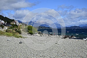 rocky shore of the Beautiful lakes in argentinian Lake District near Bariloche, Argentina