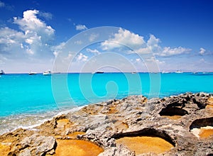 Rocky shore of formentera turquoise sea