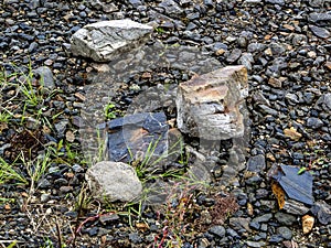 Rocky shore of lake Uvildy in inclement weather