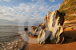 Rocky shore line at sunrise