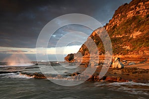 Rocky shore line at sunrise