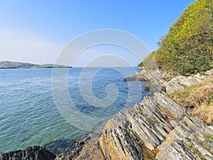 On the rocky shore of the River Dwyryd estuary on a bright spring day