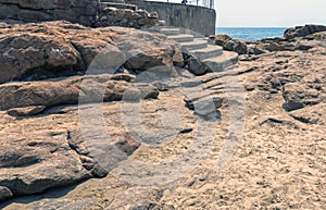 Rocky Shoreline Against Ocean Sky Coastal Landscape