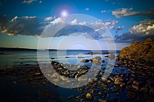 Rocky shoreline and clouds 1