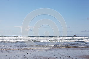 Rocky shoreline of the Pacific Ocean at Cannon Beach, Oregon, USA