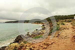Rocky Shoreline of Playa de Binigaus, Menorca photo