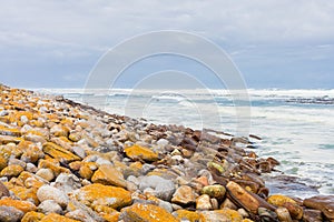 Rocky shoreline on a rough coastline seaside in Cape Town South