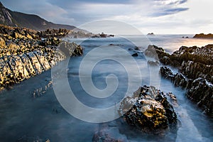 Rocky shoreline at Storms river mouth South Africa