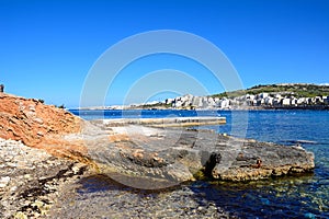 Rocky shoreline at San Pawl, Malta. photo